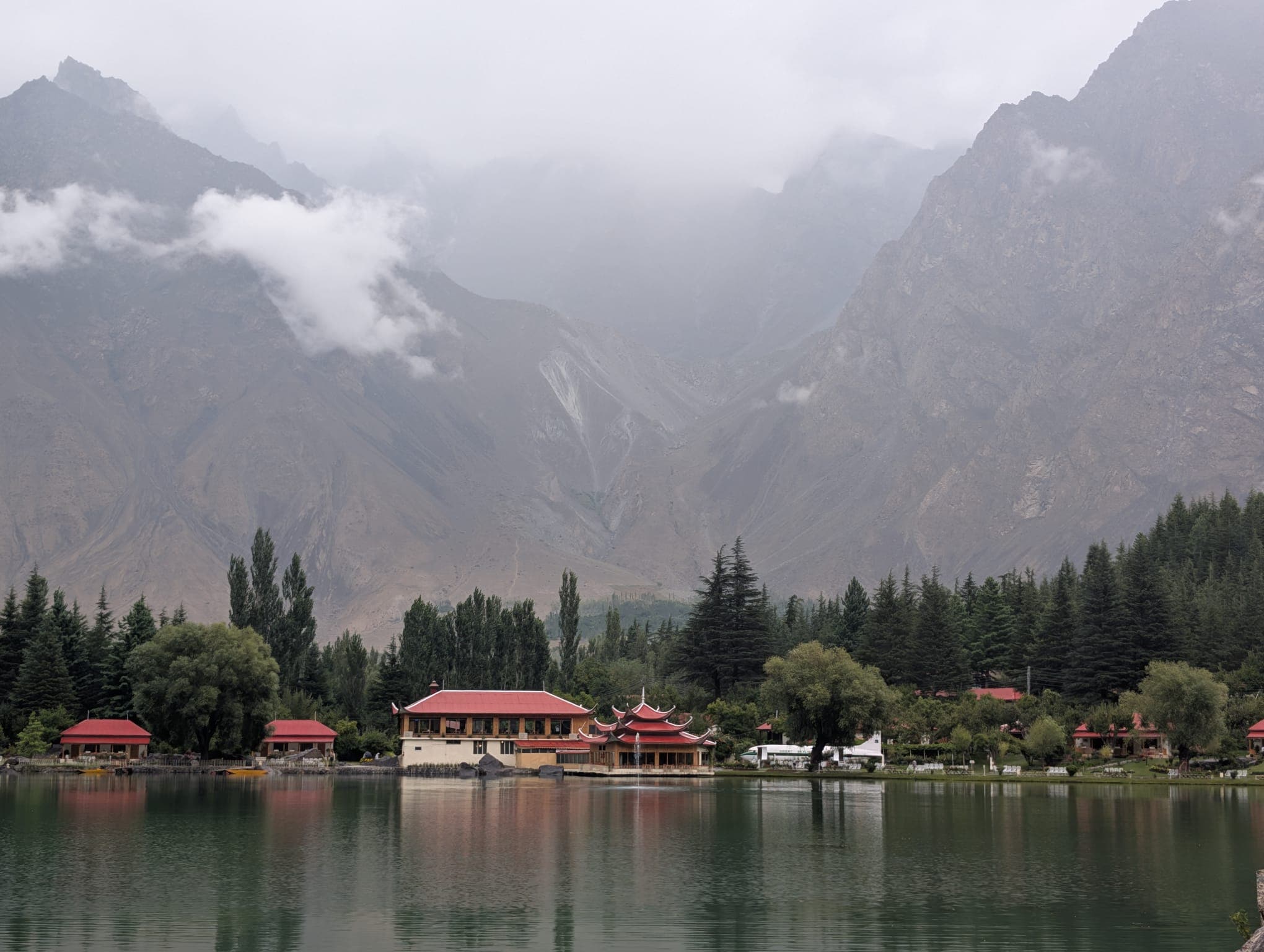 A turquoise alpine lake surrounded by the mountains of Skardu